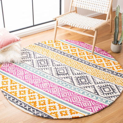 Lobdell Hand Tufted Wool/Cotton Geometric Rug in Ivory/Rust