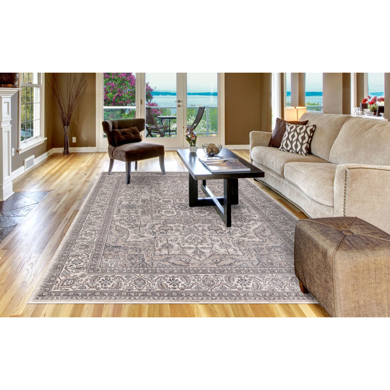 Ivory and Gray Synthetic Traditional Area Rug 6'7" x 9'3"
