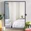 Miroir mural en fer