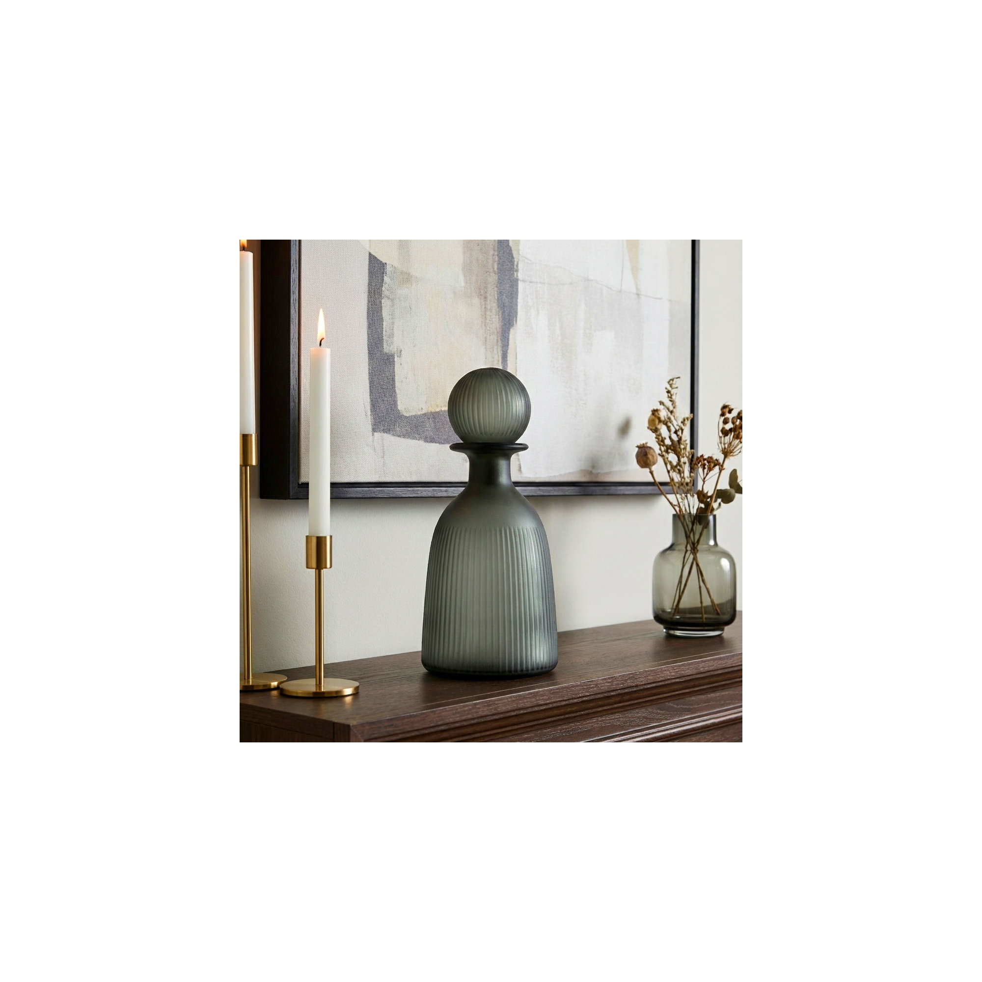 Glass Vase with Vertical Ribbed Detailing and Round Stopper Accent Aligned to Coastal Trend for Modern Decorative Display in Contemporary Interior Settings.