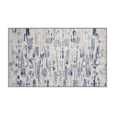 Tapis gris lavable à la machine