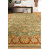 Hand Knotted Wool Oriental Area Rug in Green And Red