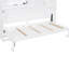 Lit simple blanc avec armoire et tablettes pliantes peu encombrantes, pour les petits espaces