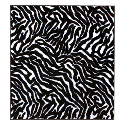 Tapis noir / beige à imprimé animal
