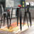 Toquerville Square Metal Indoor-Outdoor Bar Table Set with 2 Stools with Backs-1064872368