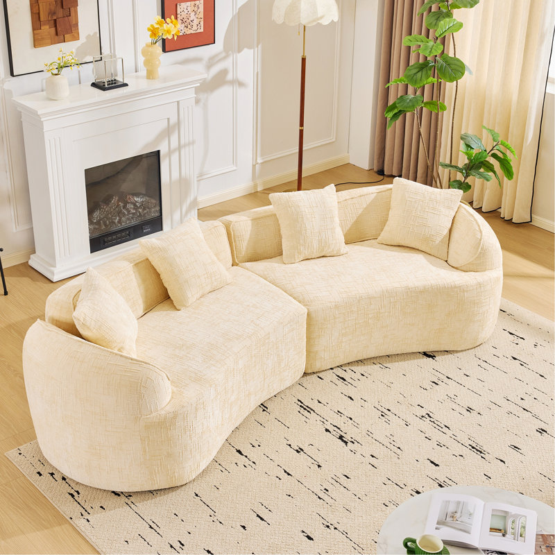 Canapé courbé avec quatre coussins, Beige
