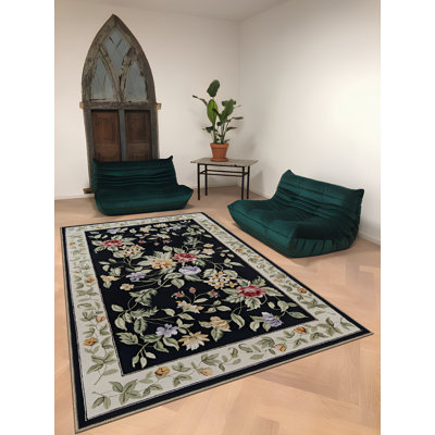 Tapis noir et beige multicolore à motif floral rose