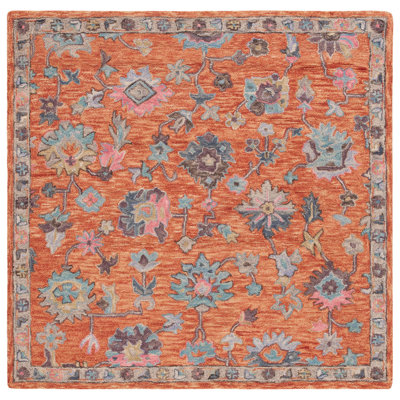 Kalja Hand Tufted Wool/Cotton Oriental Rug in Rust/Blue