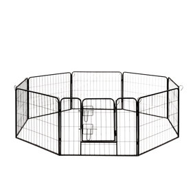 Black metal outdoor dog pen.