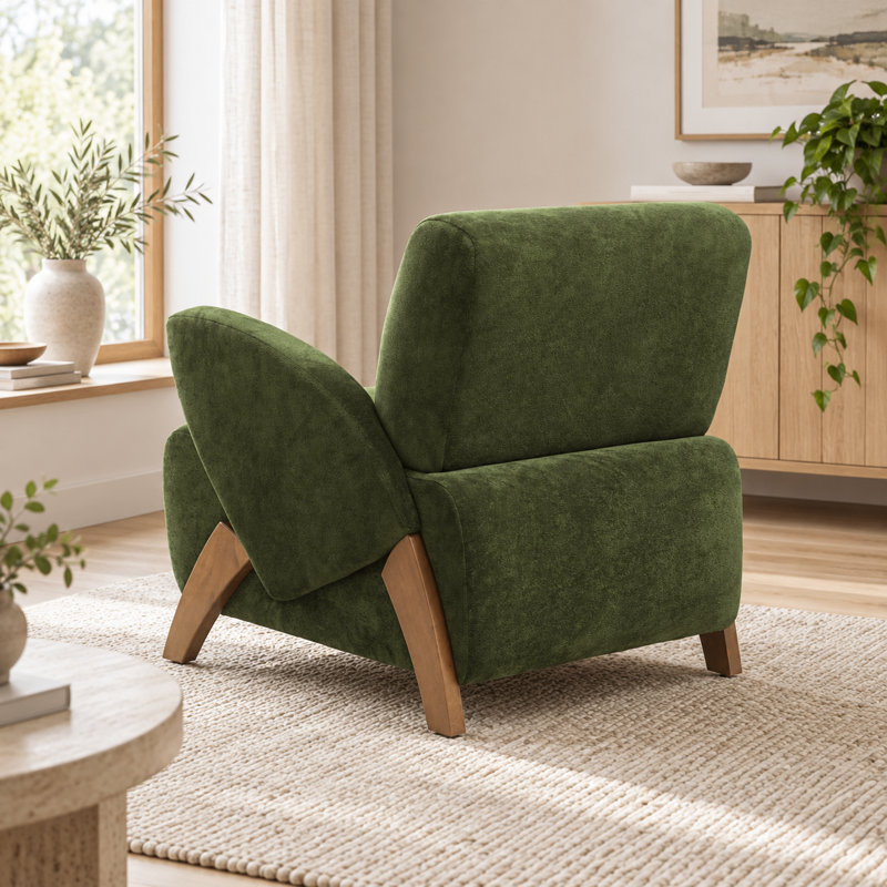 Fauteuil d'appoint moderne et compact en velours, avec accoudoirs incurvés et pieds en bouleau massif, idéal pour le salon, le bureau ou la pièce à vivre.