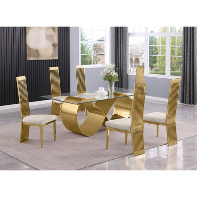 High Class Dining Set With Clear Glass Table And Stainless Steel Frame by Orren Ellis