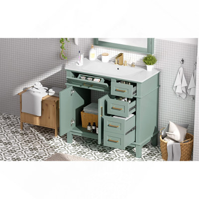 36" Light Green Ceramic Sink, Soft-Close Door, and 4 Storage Drawers , offering a refined look with practical everyday functionality.
