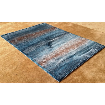 Tapis bleu tissé à la machine Hatsu