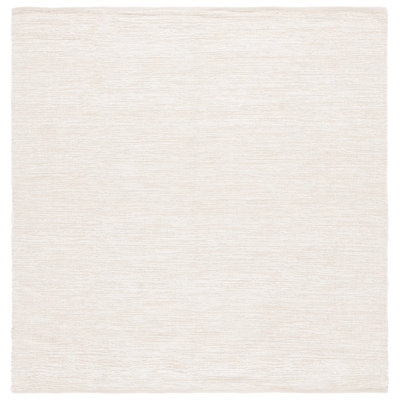 Tapis ivoire en coton recyclé touffeté à la main Jhalae