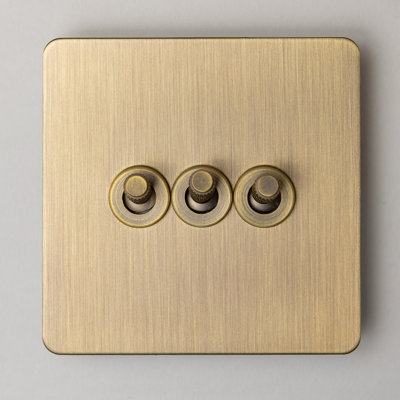 Foundry Series Knurled Toggle Switches and Sockets – Antique Brass (3 Gang 2 Way Toggle)