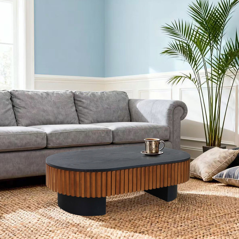 Table basse elliptique de 111 cm (43,7 po) au design unique en forme de champignon, avec rangement dissimulé pour accessoires de bureau. Table contemporaine, couleur noir et brun, solution multifonctionnelle.