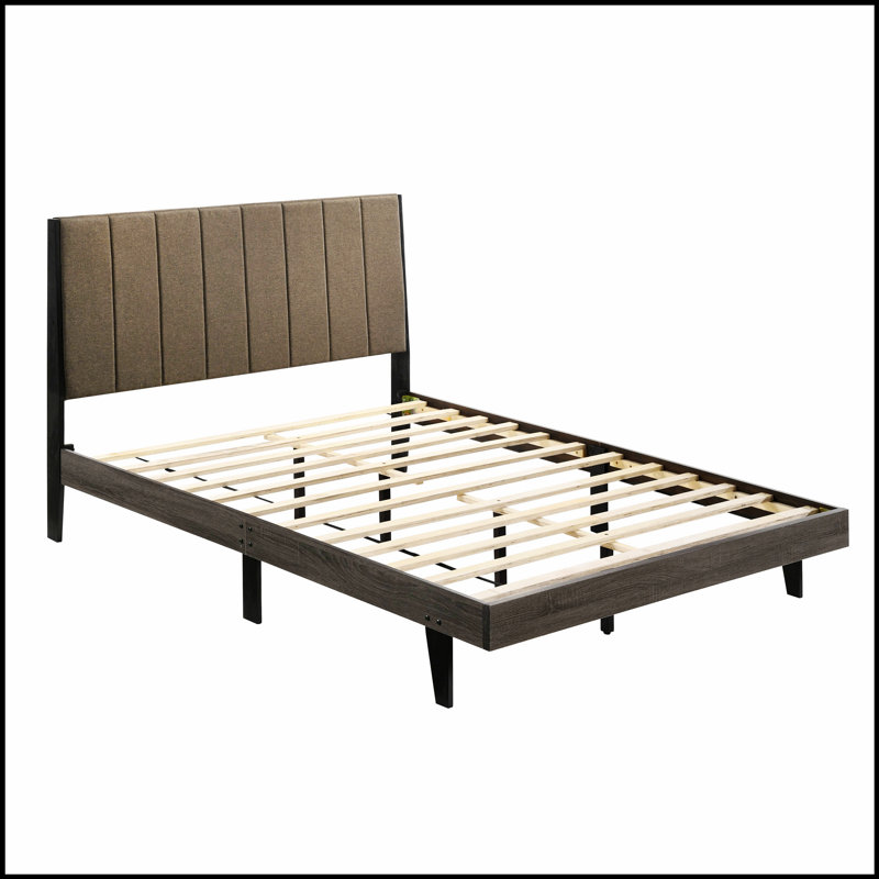 Lit rustique brun et gris patiné, alliant durabilité et design tranquille pour une retraite confortable.