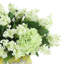 Arrangement d'hortensias et de lilas dans un vase décoratif