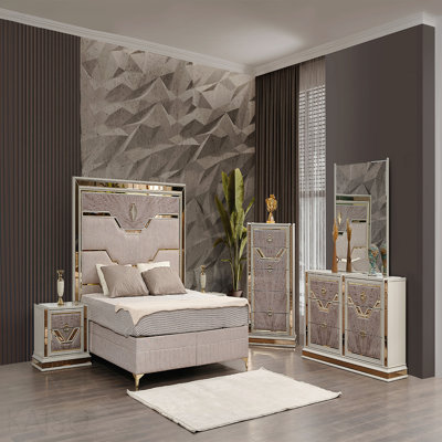 Commode 5 tiroirs de style moderne en bois et accents dorés de couleur beige