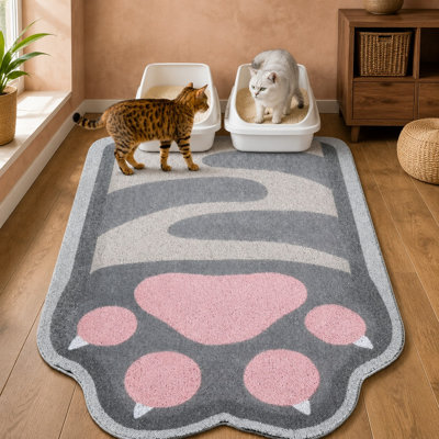Ce grand tapis à litière de 40 x 30 pouces utilise un filet à boucles en PVC souple pour capturer la litière et est doté d'un support antidérapant pour une protection du sol facile à nettoyer et une décoration intérieure réussie.