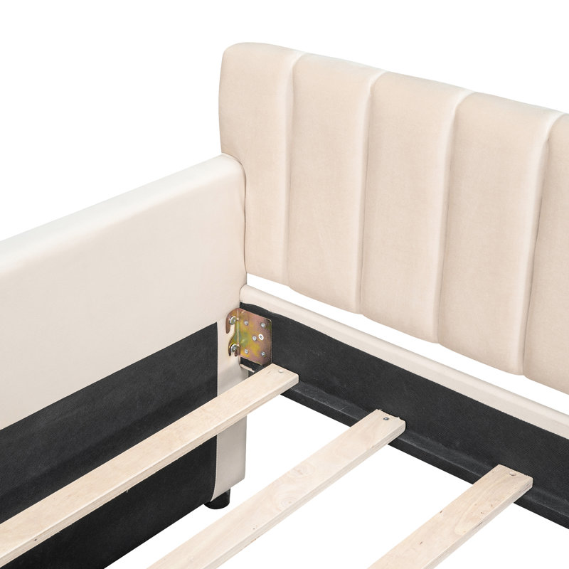 Lit de jour simple rembourré beige avec tiroirs pratiques et base spacieuse en lattes de bois pour un cadre de rangement fiable