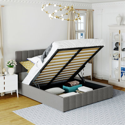 Lit élégant pour appartement, chambre d'amis, lit tapissier élégant avec système de rangement hydraulique