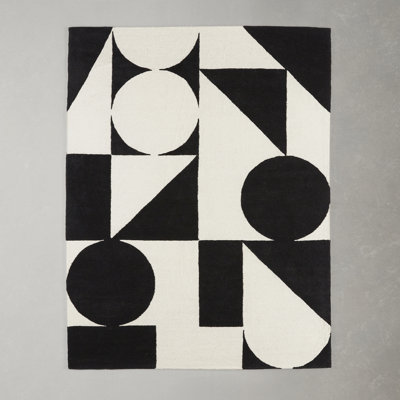 Tapis ivoire / noir en laine touffeté à la main à motif géométrique