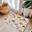 Tapis tressé à charme squelette pâle-106464392