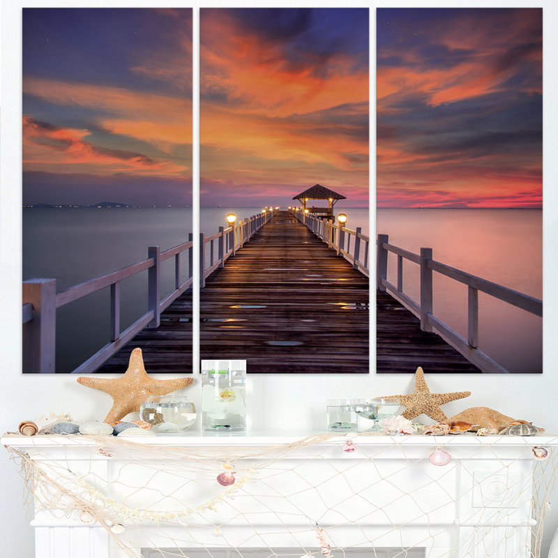 Ensemble de 3 impressions sur toile tendue, "pilier de mer foncé" sous ciel coloré-ensemble de 3 impressions sur toiles tendues
