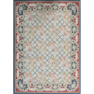 Tapis vert et rouge noué à la main de haute qualité