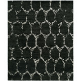 Maplewood Geometric Area Rug in Black