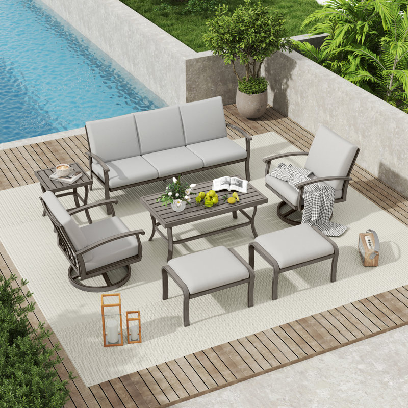 Ensemble de conversation de patio 7 pièces en aluminium avec table basse, table de bout, repose-pieds et coussins gris clair