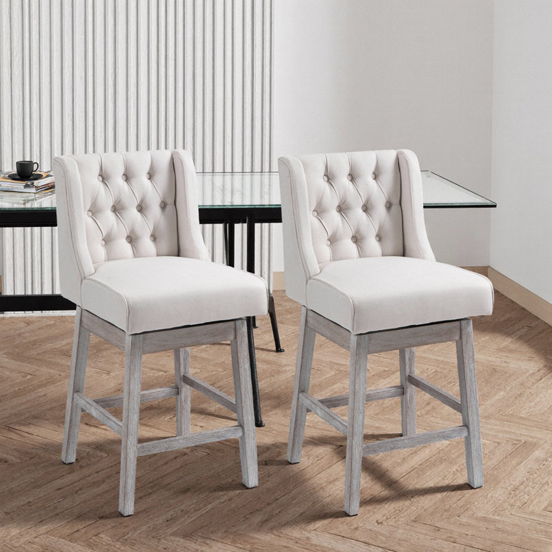 Ensemble de 2 tabourets de bar pivotants beiges avec rotation à 180 degrés, conception capitonnée et repose-pieds en bois massif