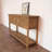54.33" Brown Rectangular Solid Wood Console Table