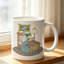 A Comfortable Bedroom Setting Featuring a Frog in Attire on a Ceramic Coffee Mug, Perfect for Tea, Milk.