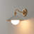 Modern Gold Wall Sconce with Pleated Metal Shade