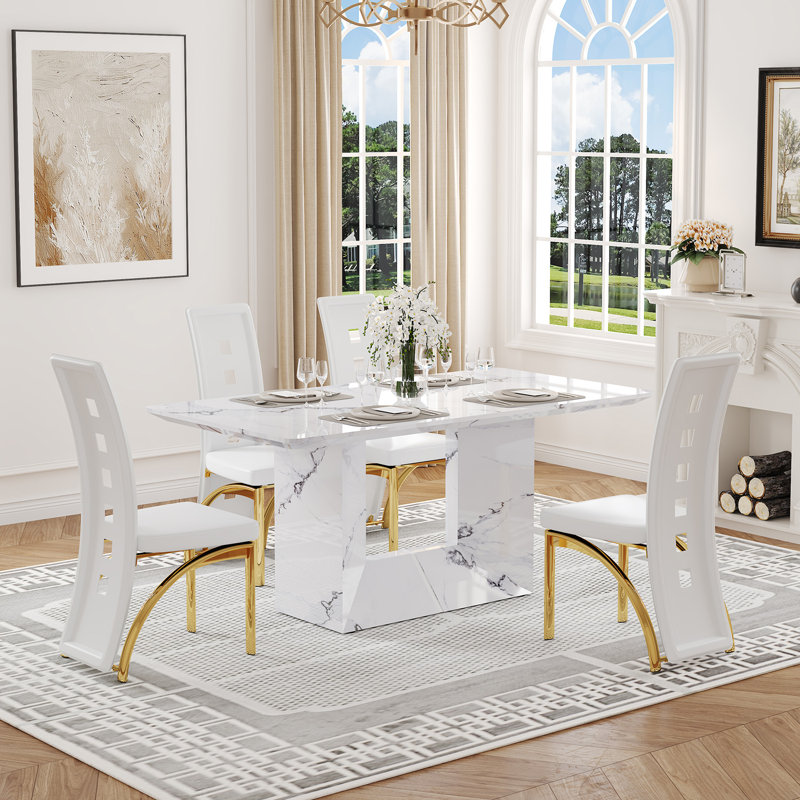 Mercer41 63'' Faux Marble Dining Table Set with Faux Leather Chairs ...
