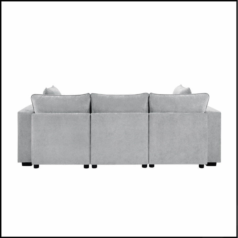 Canapé d'angle moderne au design modulaire, pouf amovible, accoudoirs de rangement et ports USB pour une utilisation polyvalente