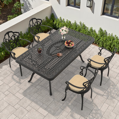 Ensemble de salle à manger d'extérieur 5 pièces en fonte d'aluminium, table rectangulaire de 170 cm de long avec trou pour parasol et 4 fauteuils avec coussins beiges
