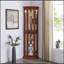 Superbe armoire de coin avec tablettes réglables et dossier en miroir, idéale pour exposer des objets précieux et ajouter de l'élégance à tout espace.