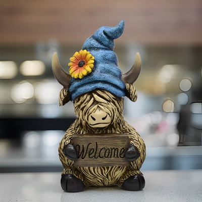 Figurine de vache Highland 8 "avec chapeau bleu H 8"