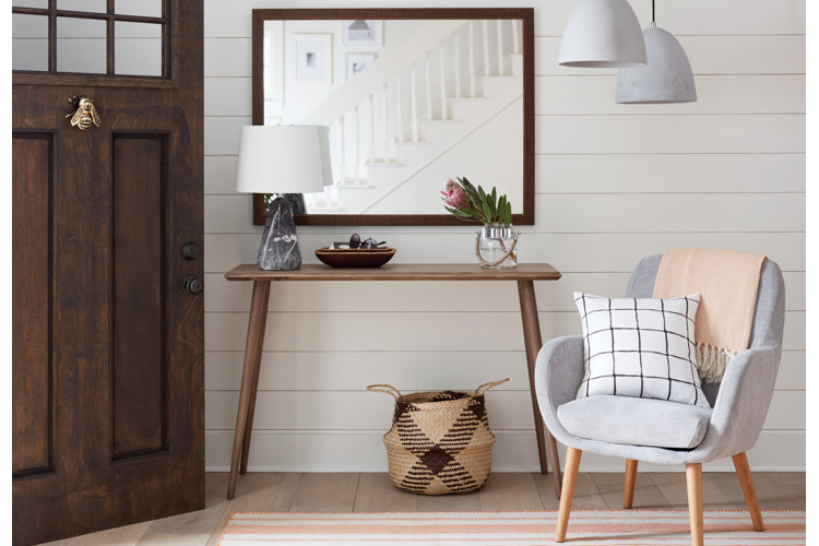 modern entryway with console table and accent chair
