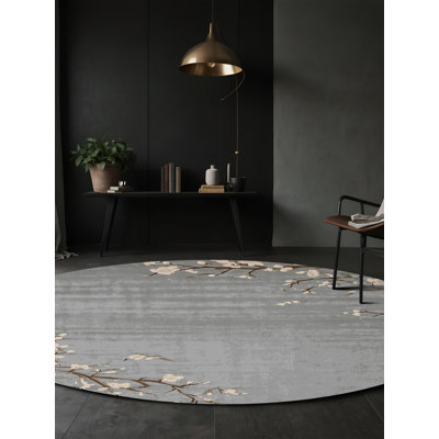 Tapis gris soyeux et moelleux