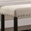 Banc en tissu bleu avec garniture cloutée et repose-pieds-130190909