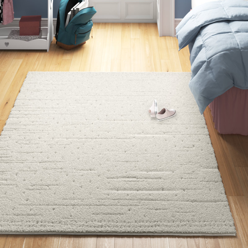 Athira Machine Woven Cream Area Rug, Rectangle 6'7" x 9'
