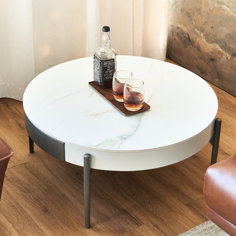 Table basse de salle à manger moderne avec pieds gris et surface en céramique