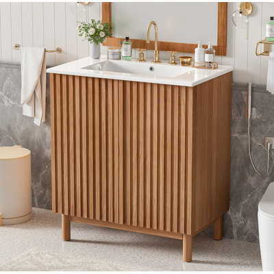 Meuble-lavabo autoportant à panneau cannelé traditionnel avec lavabo en céramique, pieds en bois massif, armoire en panneau de fibres à densité moyenne, portes à fermeture en douceur et tablette de rangement réglable en forme de U