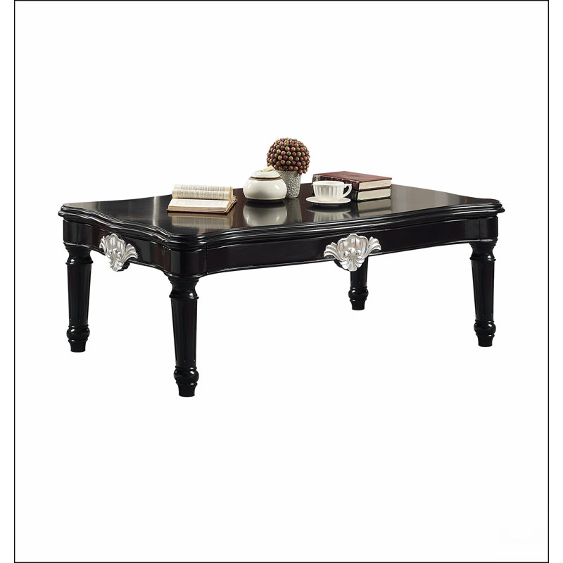 Table basse noire avec pieds tournés
