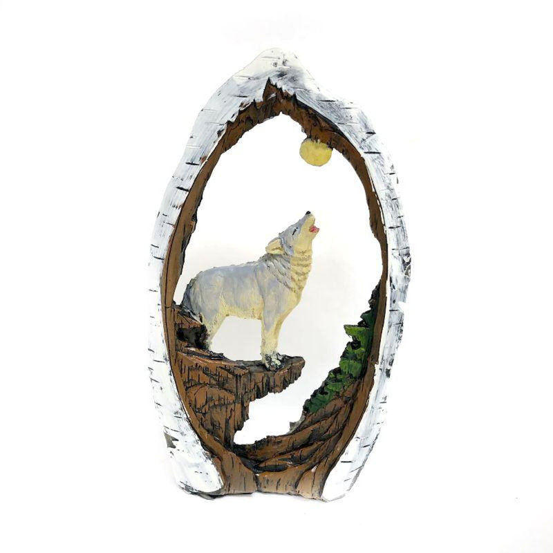 Figurine loup dans un bouleau
