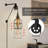 Kathyria Plug-in Armed Sconce